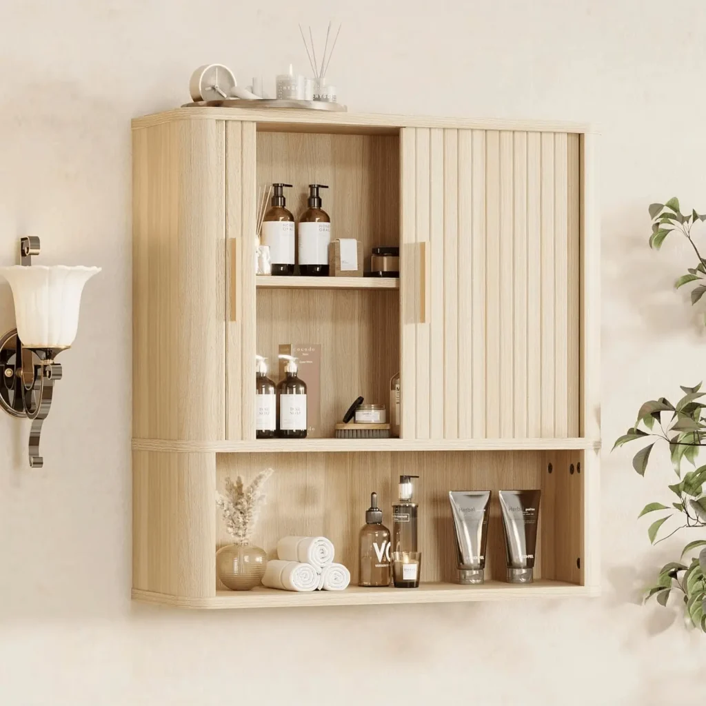 Fluted wall cabinet with sliding doors and adjustable shelf for laundry room storage