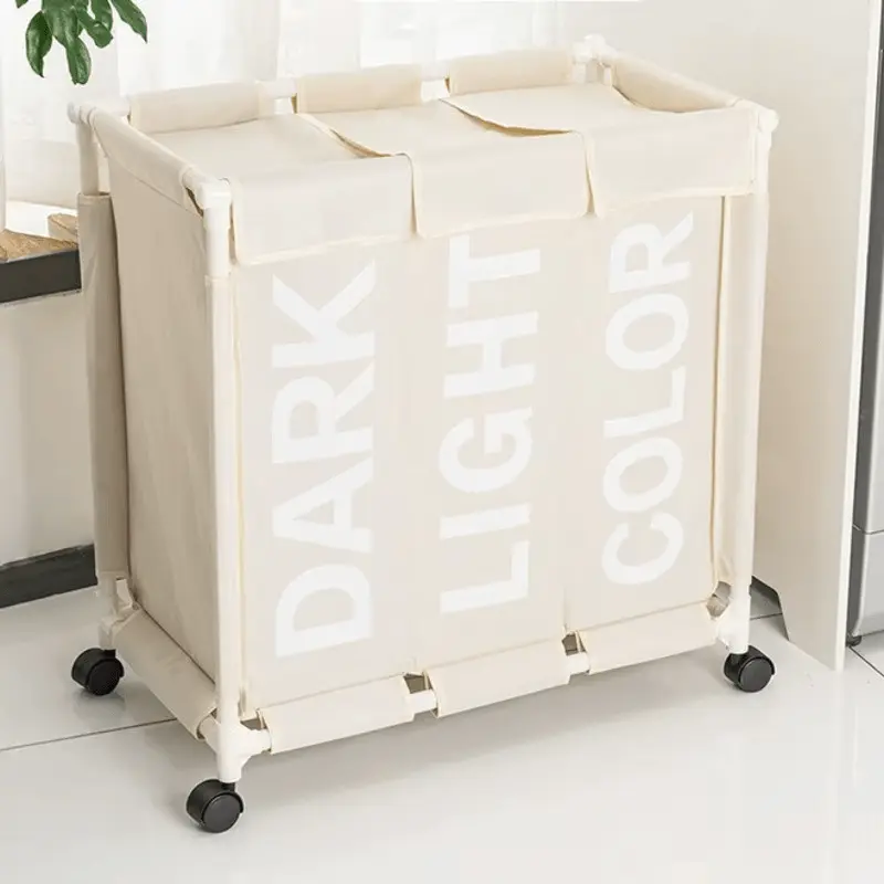 Rolling 3-grid laundry basket organizer with waterproof laundry bags for sorting dirty clothes