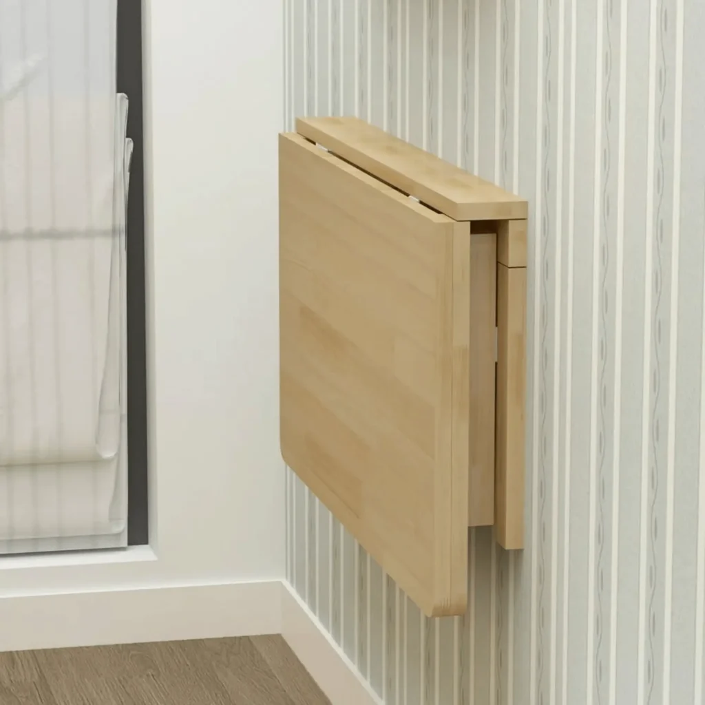 Solid wood wall-mounted folding table folded down for a compact laundry room workspace