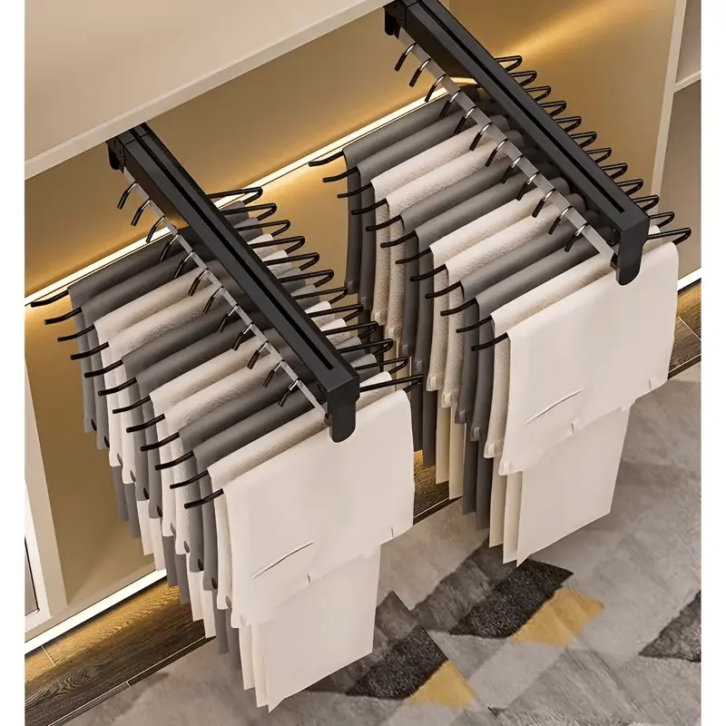 Pull-out retractable wardrobe hanger rail with telescopic clothes hanging rod for organizing shirts, trousers, jackets, and garments inside wardrobes.